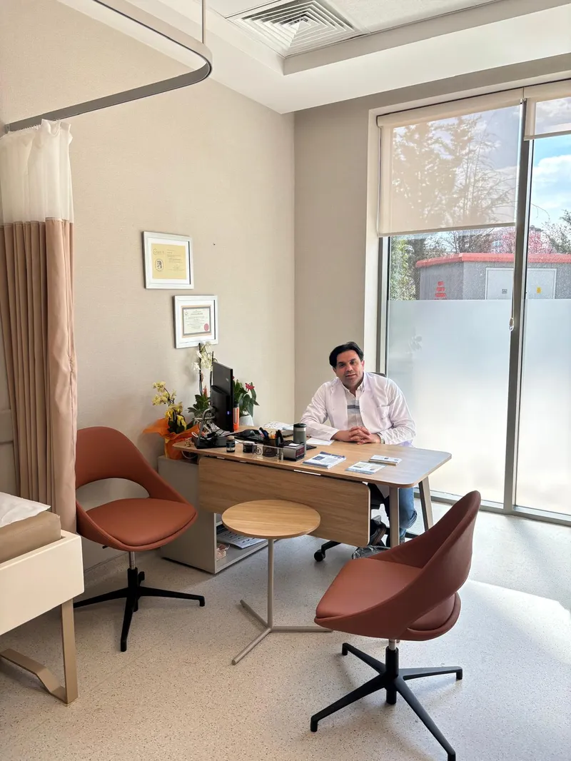 Op. Dr. Emre Kaya — in hospital corridor